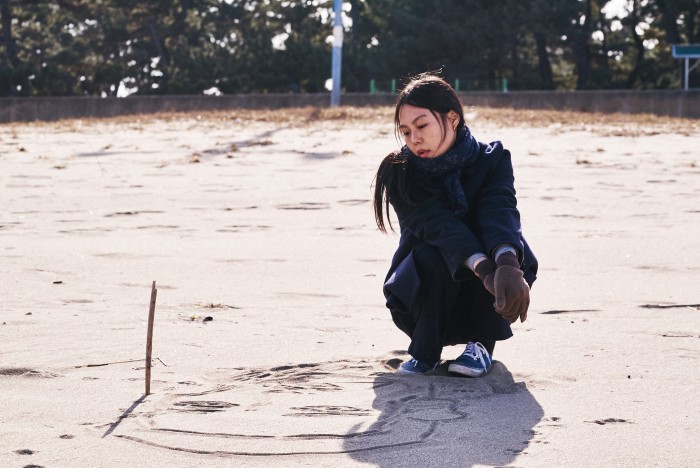 Korean woman on the beach in film