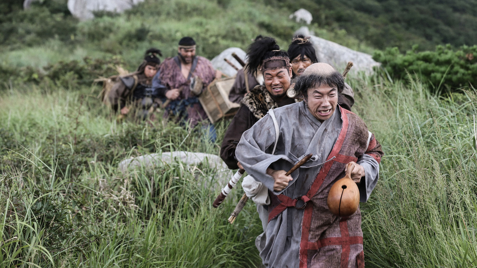 Korean Monk running with bandits